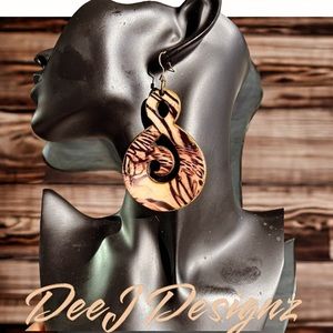African wood and fabric print earrings. 3.5” drop. Hypoallergenic earring wires